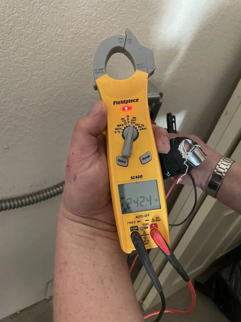 Voltage testing with clamp meter during Generator Installation in San Angelo